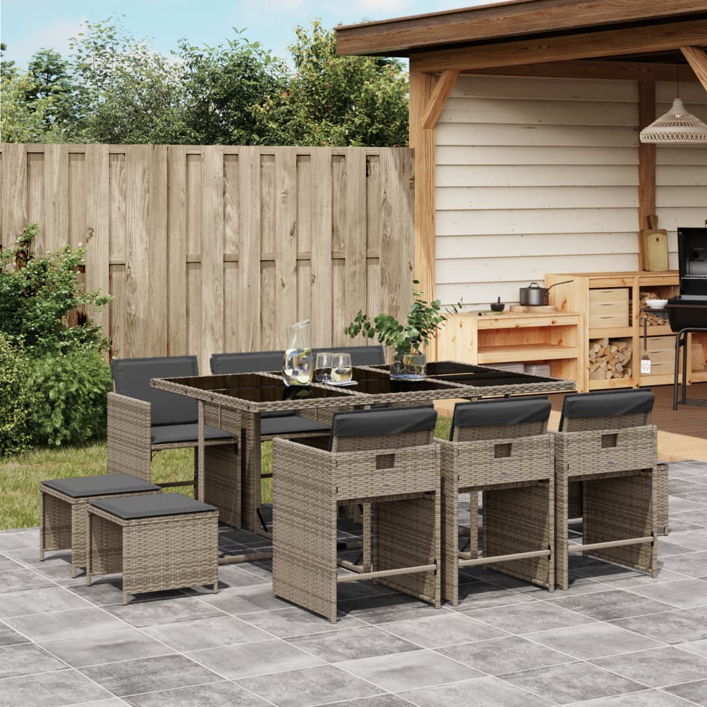 11-Piece Black Poly Rattan Dining Set with Plush Cushions for Outdoor Dining