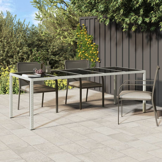 Luminous Serenity: Garden Magic with White Poly Rattan Table and Tempered Glass