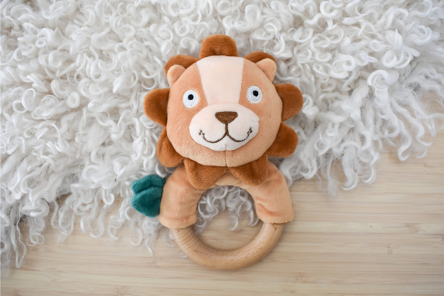 Snuggle buddy hugsworth lion wooden ring rattle