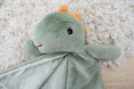 Snuggle buddy minty dinosaur blanket