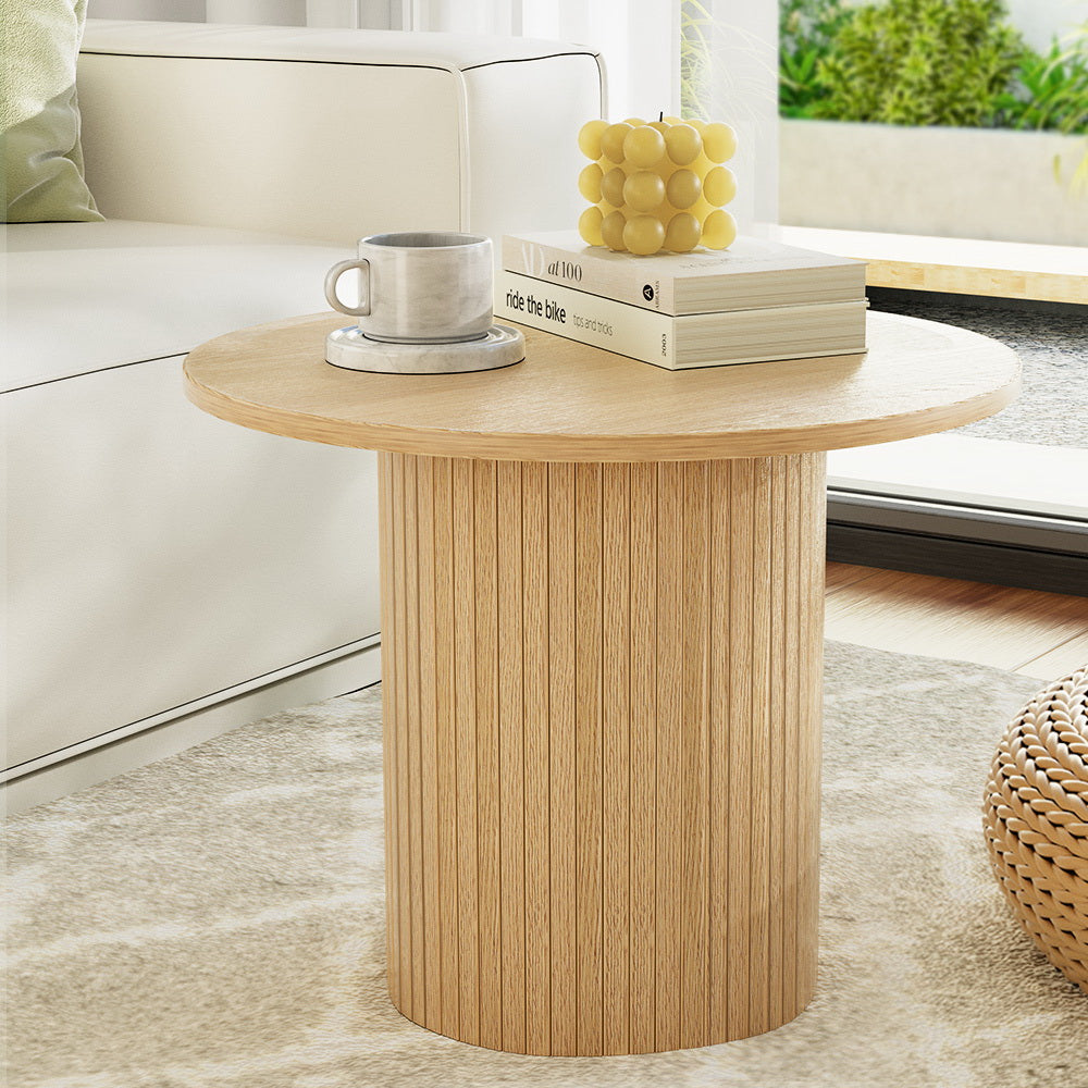 Elegant Round Coffee Table with Fluted Base