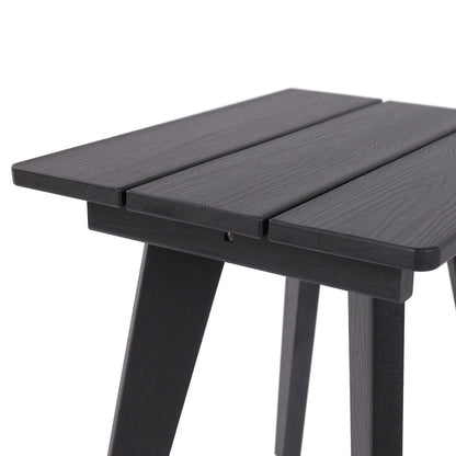 Black table, in room setting